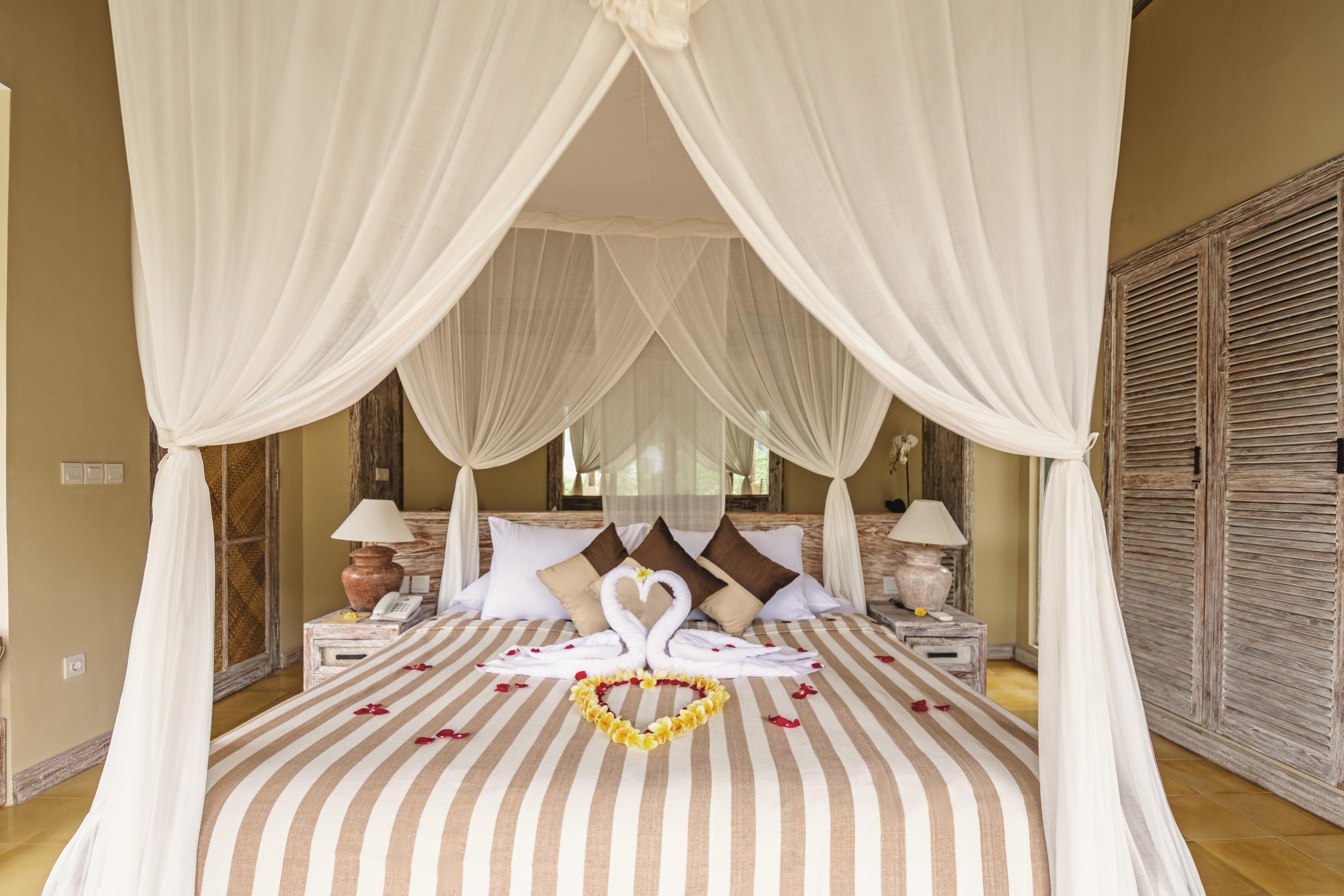 Wapa Di Ume Sidemen Hotel Sidemen  Exterior photo A bed with a mosquito net